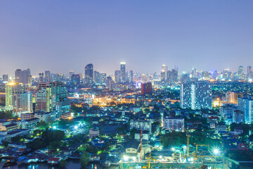 Bangkok City skyline aerial view at night time and skyscrapers of midtown bangkok