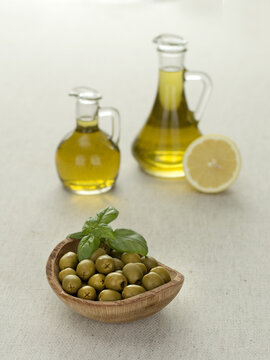 olive oil with green olives,vegetarian food.  