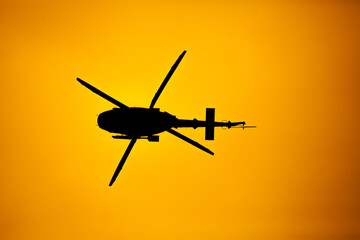 Fototapeta na wymiar Military helicopter on a mission.
