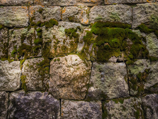 Close up wall surface level, exterior wall modern design. Interior design to stack pieces of stone on wall. Beautiful stone wallpaper.