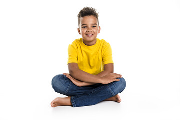 Adorable african boy on studio white background