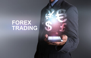 Businessman holding smart phone world of currency forex trading with one hand - obrazy, fototapety, plakaty