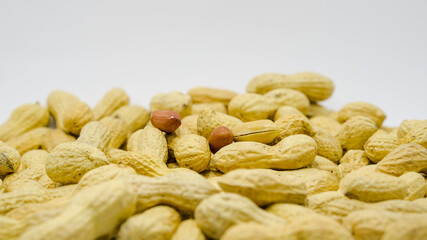 Dried peanuts on isolated white background