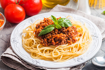 Spaghetti bolognese with ingredients