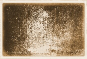 Retro sepia wall surface close up with faded borders for texture or background.