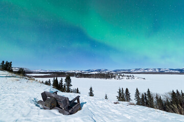 Bench looking on Lake Laberge with Northern Lights