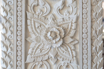 Traditional Thai style art on wall.