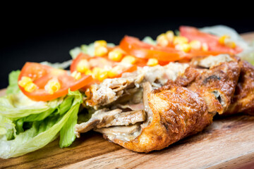 Japanese cuisine - omelet rice warpped on a plate