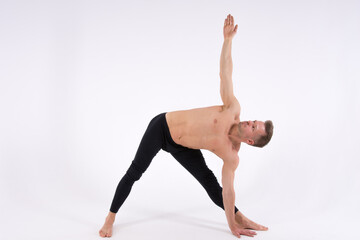 Naklejka premium Yoga. Sexy man and a healthy lifestyle. Sport and strength. 