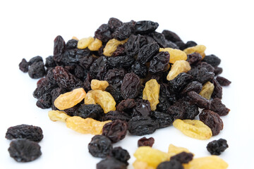 Dried raisins on a white background