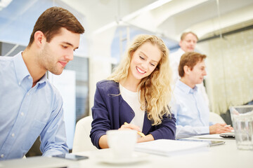 Business people planning together a strategy