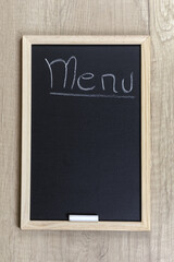 Space chalkboard background texture with wooden frame for food, drink coffee and menu. blackboard space for wallpaper. Landscape mounting style vertical.
