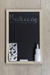 Space chalkboard background texture with wooden frame for medicine, pills. blackboard space for wallpaper. Landscape mounting style vertical.
