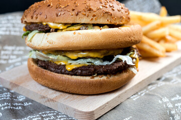 Cheese burger - American cheese burger with Golden French fries