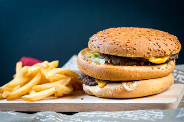 Cheese burger - American cheese burger with Golden French fries
