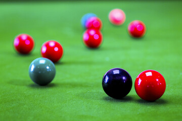 Colorful of snooker balls on green table