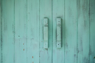 A vintage green wooden double