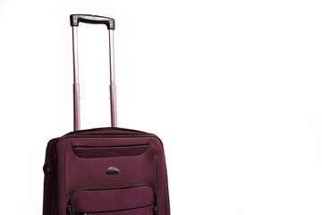 Travel accessories on white wooden background.