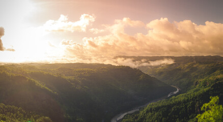 Fototapeta na wymiar sunrise over a valley in indonesia