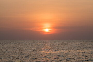 Naklejka na ściany i meble Sunset at the sea
