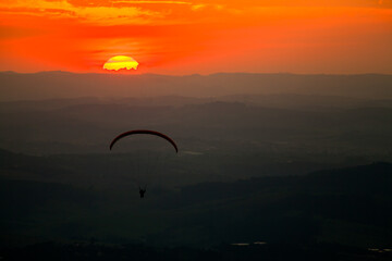 Paragliding in sunset
