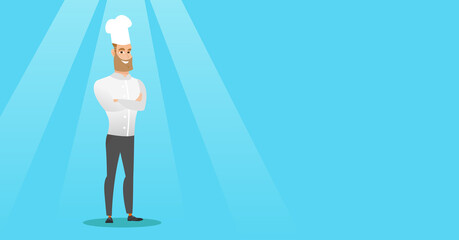 Confident male chief cook with arms crossed.