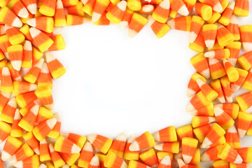 Halloween candy corns on white background