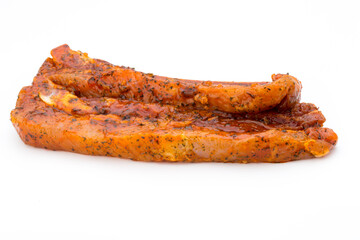 Spicy marinated spare ribs barbecued on the white background.