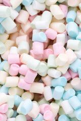 Background or texture of colorful mini marshmallows.