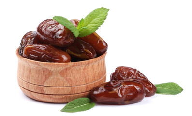 date fruit in wooden bowl isolated on white background