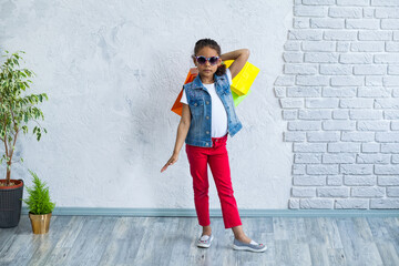 Happy afro girl with shopping bags