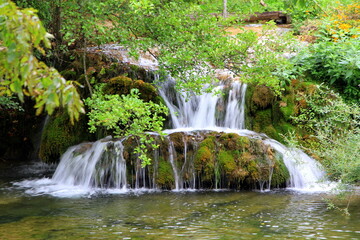 Fototapeta na wymiar Picturesque waterfall in Rastoke, the hidden jevel of Croatia near the Plitvice park