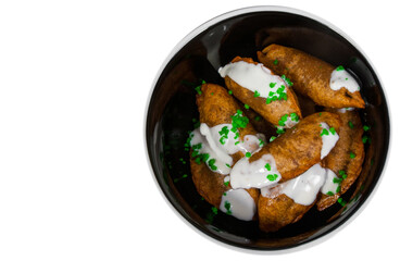 Fried Ravioli with Sauce. top view. isolated on white