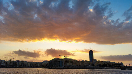 Fototapeta premium Sunset over San Giljan, Malta