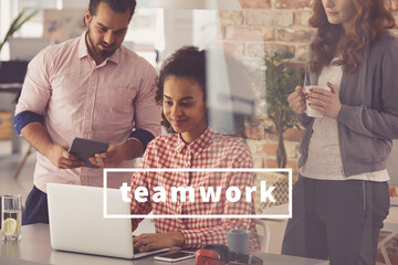 Business team working on laptop