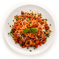 Spaghetti bolognese on white background