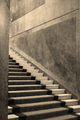 Luxury and ancient monumental staircase. Sepia effect applied.