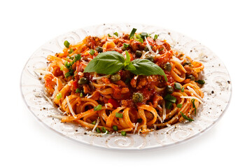Pasta with bolognese sauce on white background
