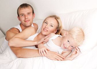 family in bed