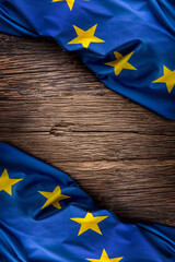 Flag of Europe union on old wooden background. EU flag old oak background.Vertical.