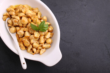 Mushrooms in mustard marinade, black background