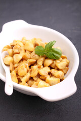 Mushrooms in mustard marinade, black background