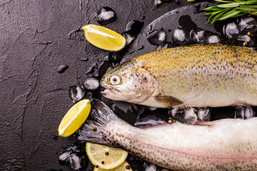 Seafood. Two raw rainbow trouts marinated with lime, rosemary