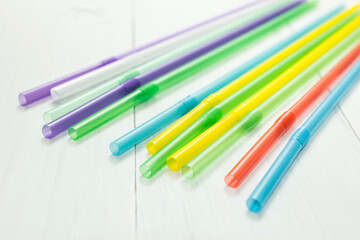 Multicolored strawberry cocktail on white table, party. Celebratory background.