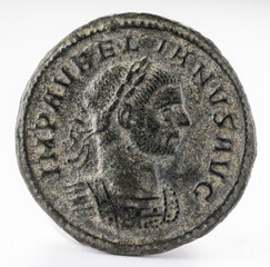 Ancient Roman copper coin of Emperor Aurelian. AE Denarius. Obverse.