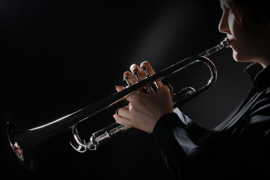 Trumpet player hands. Trumpeter playing jazz musician