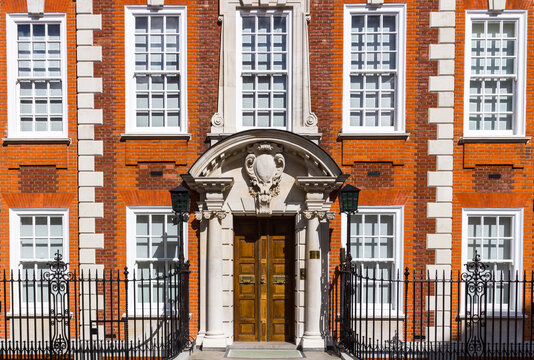 The facade to a traditional town house typical to the district of central London