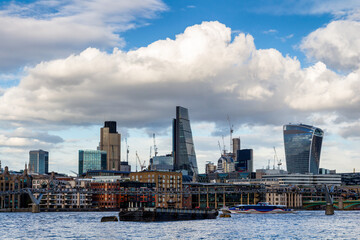 Naklejka premium Business district with famous skyscrapers and landmarks at golden hour, London, UK