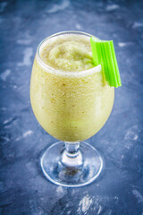 Green smoothie with celery, banana and apple