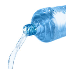 Water pouring from plastic bottle on white background